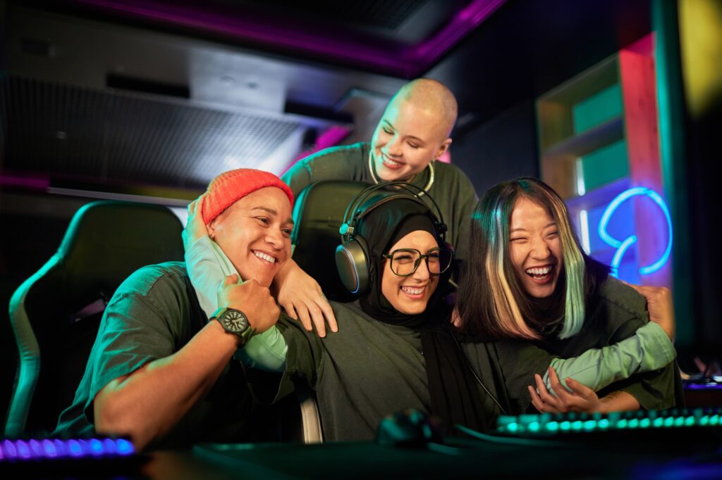 Diverse Team of Female Gamers Celebrating Victory