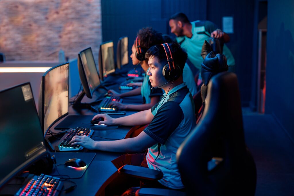 Smart gamer challenging video game in computer club